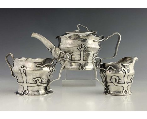 An Arts and Crafts silver three piece tea set, William of Birmingham, probably Birmingham Guild of Handicraft, Birmingham 190