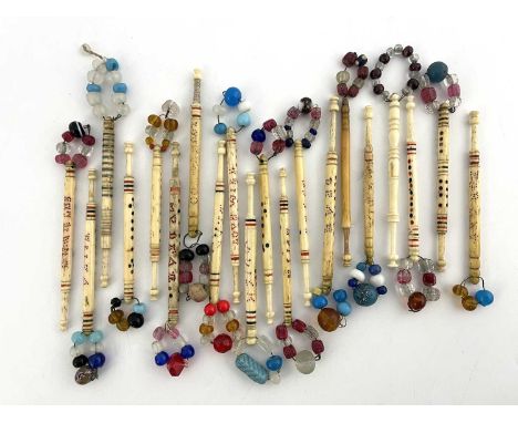 Twenty antique bone lace bobbins with mottos and names, many made by 'Bobbin' Brown, mottoes, Love will U Marry, Forget me No