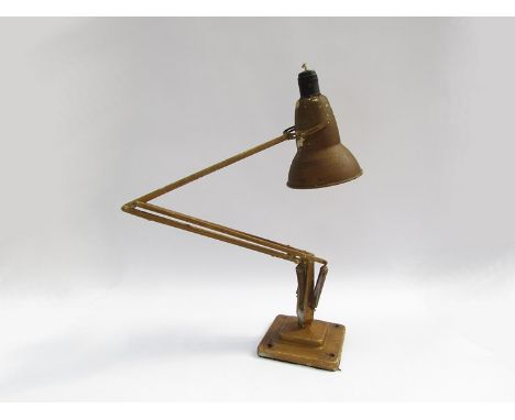 An early step based Herbert Terry angle poise lamp 