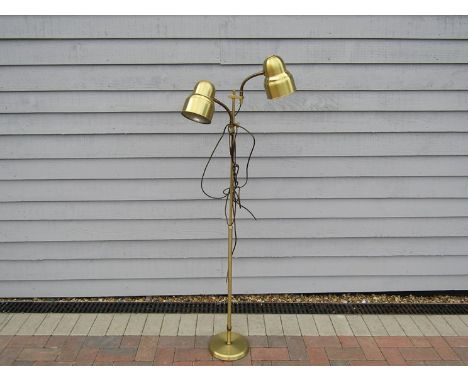 A Danish brassed standard lamp with twin adjustable spots 