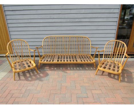 An Ercol light elm Windsor three piece suite 