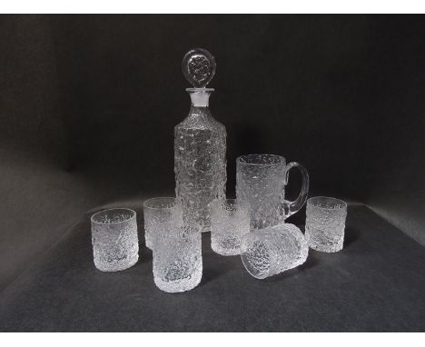 A Whitefriars "Glacier" range decanter and stopper designed by Geoffrey Baxter, 1967, six glacier glasses and glacier tankard