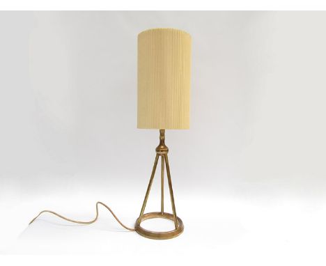A 1950's brass table lamp base, metal rod tripod and ring base. Possibly Italian. Corrugated cylindrical shade. Base 41cm hig