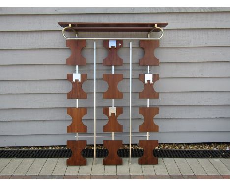 A wood and metal wall hanging coat hanger 