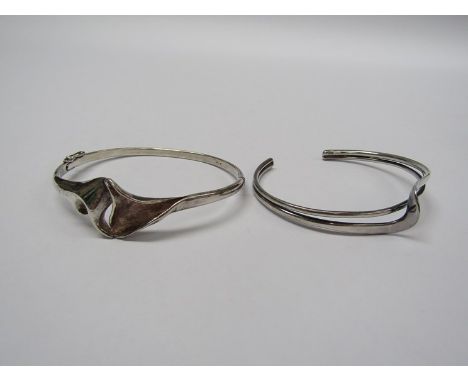 A modernist Lapponia style silver bangle and another similar silver bangle 