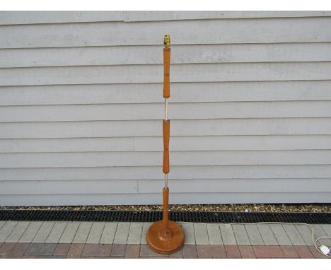 A light oak finish standard lamp 