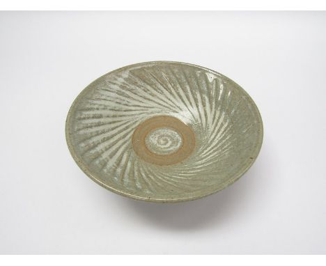 MARIANNE DE TREY (1913-2016): A standard ware bowl with ash glaze over fluted interior. Impressed seal, 7cm high x 20.5cm dia