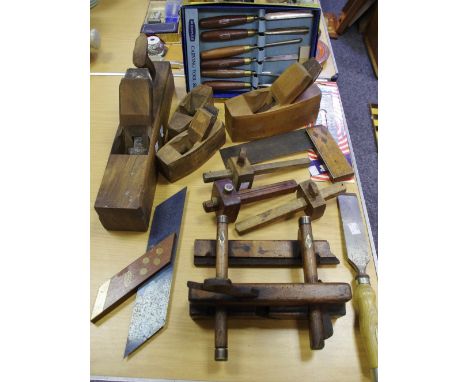 A vintage beech and brass plough plane; a Marple M60A wood carving set, boxed (unused); a Marples double hooped firmer chisel