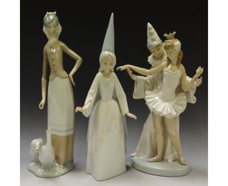A Lladro Pierrot and Ballerina, others; lady with geese; a Fairy Godmother. 