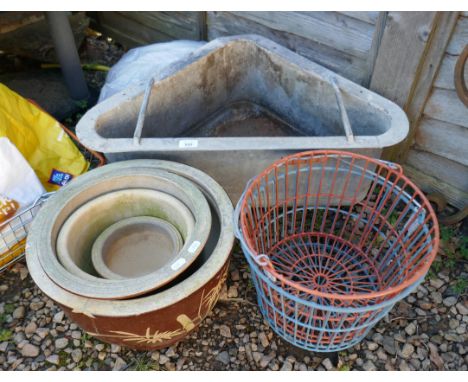 Hay feeder, egg baskets and ceramic pots 