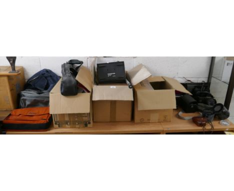 Large collection of camera equipment to include Canon camera together with a number of camera lenses, filters, tripod, pieces