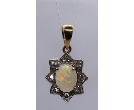 9ct gold opal and diamond pendant 