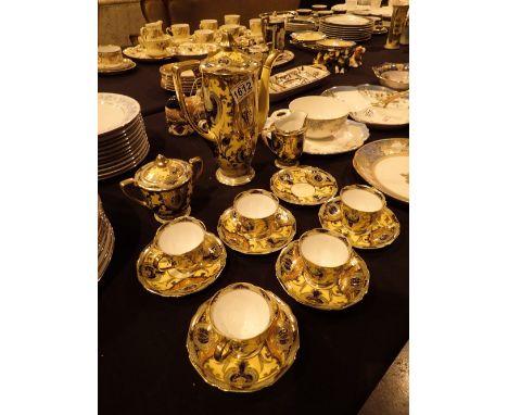 Highly gilded fourteen piece Noritake coffee set  CONDITION REPORT: Lacking 1 cup, one saucer also has a slight chip and crac