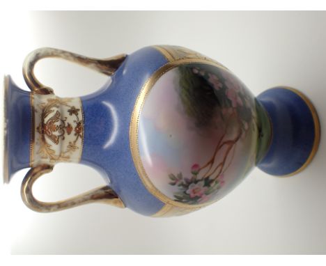 Noritake hand painted gilded twin handled vase on a blue body H: 27 cm 