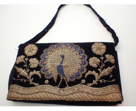 Vintage beaded bag decorated with a peacock