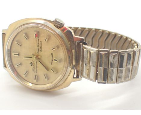 Gents yellow metal Ferel Electrotime Super Deluxe wristwatch on expanding strap CONDITION REPORT: This item is working at lot