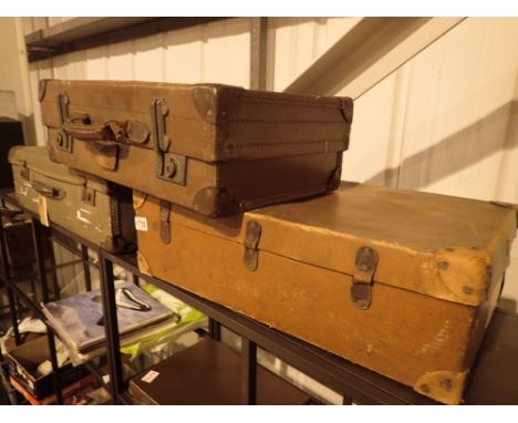 Three vintage suitcases