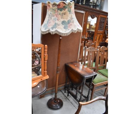 A traditional mahogany standard lamp