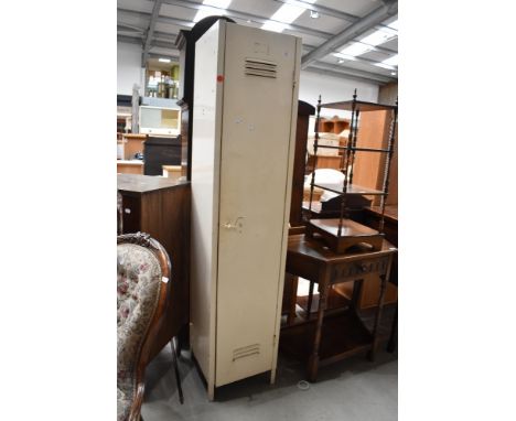 A genuine vintage metal gym or bathroom slim line locker