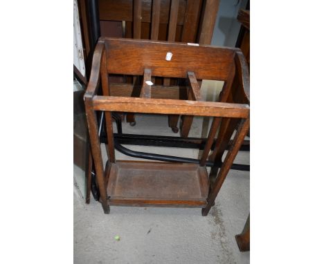 An early 20th Century oak stick/umbrella stand, with metal drip tray, width approx. 46cm