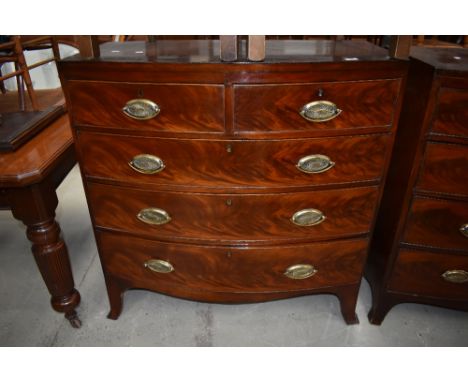 A 19th Century mahogany bow fronted chest of two over three flame fronted drawers, width approx. 105cm, near match to lot 928