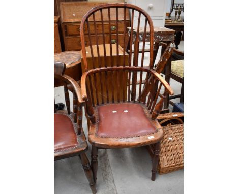 A 19th Century hoop and stick back stained frame Windsor style chair having H stretcher and later leather studded seat