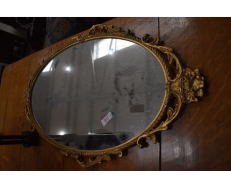 A vintage gilt framed wall mirror, approx. 66 x 39cm