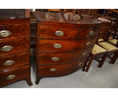 A 19th Century mahogany bow fronted chest of two over three flame fronted drawers, width approx. 105cm, near match to lot 927