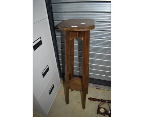 A vintage plant stand