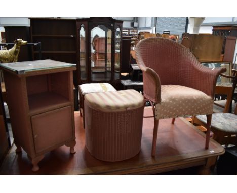 A vintage Lloyd Loom chair, retailed by Day, a similar linen stool and a woven fibre bedside chest