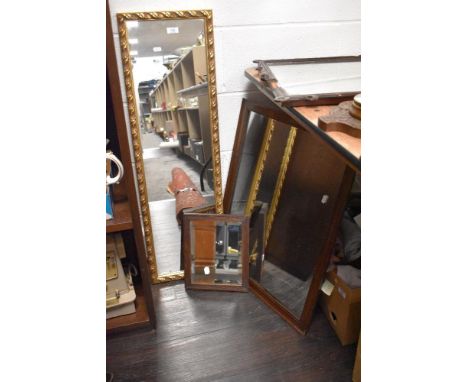 two mirrors, a vintage oak framed example and a gilt framed hall mirror.