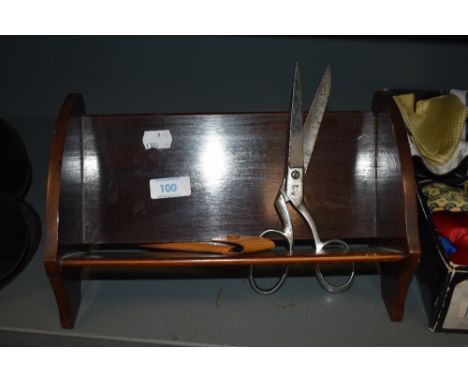 An early 20th century small wooden book trough having inlaid detail to sides, a pair of scissors and a comb having silver ton