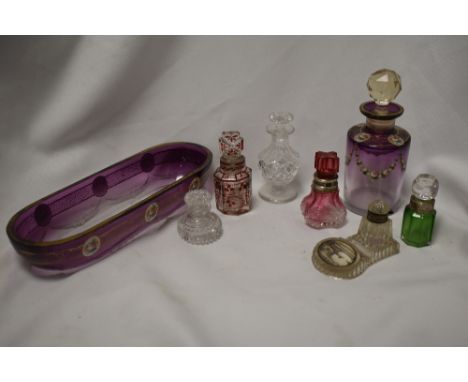 A variety of vintage and antique glassware, including souvenir ink well, perfume bottles, some having hallmarked cuffs and a 