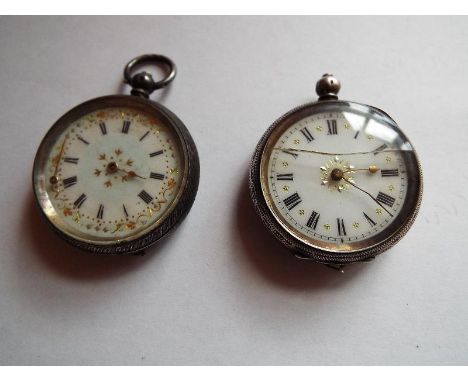 Two lady's silver cased pocket watches stamped 0,935, engine turned floral and scroll decoration throughout, Roman dials on w