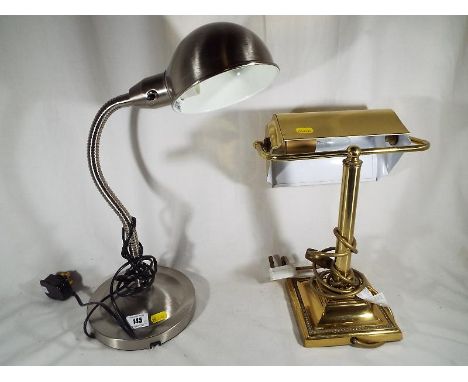 A pair of good quality table lamps, a brushed steel adjustable lamp and a heavy brass lamp (2)