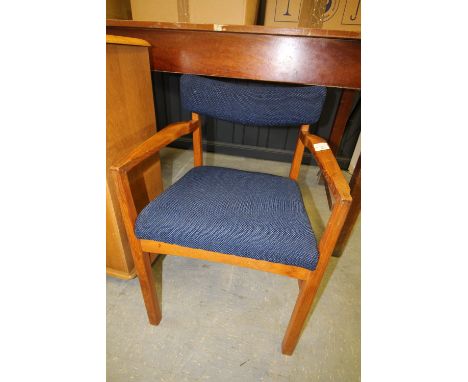 Teak armchair, yew wood finish oval table, tapestry seated chair