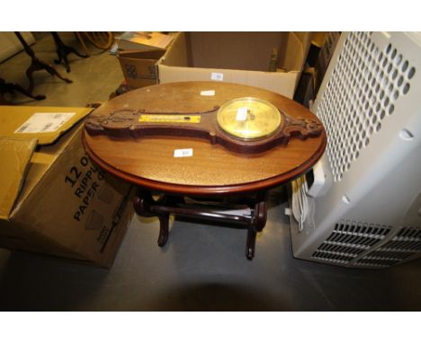 Newspaper stand and barometer