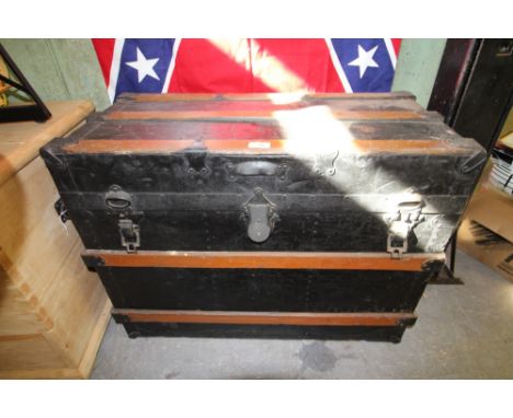 Black canvas and wood bound trunk