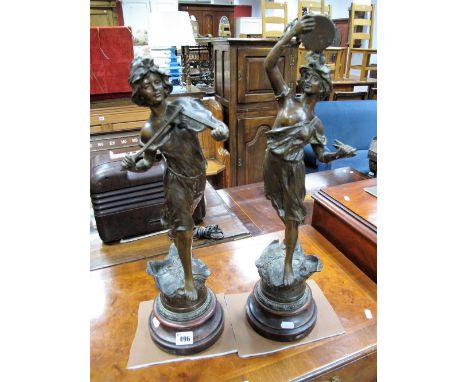 A Pair of Late Victorian Bronzed Spelter Figures, of music and dance, mounted on scales, overall 56cms high. (2) 
