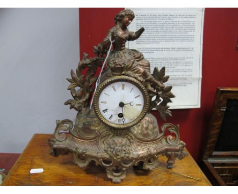 XIX Century French gilt Mantel Clock, of a female on top of clock dial, with foliage, enamel dial, (damaged).