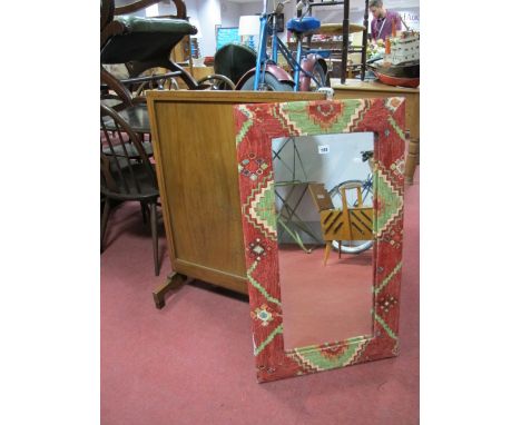 Early XX Century Walnut Firescreen, together with a rectangular shaped upholstered wall mirror. 
