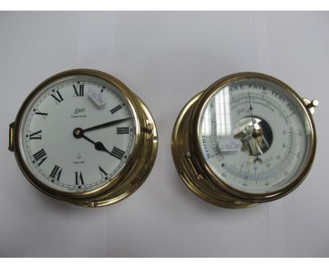 A Schatz Ocean Quartz Ships Clock, and 'Compensated' precision barometer. 