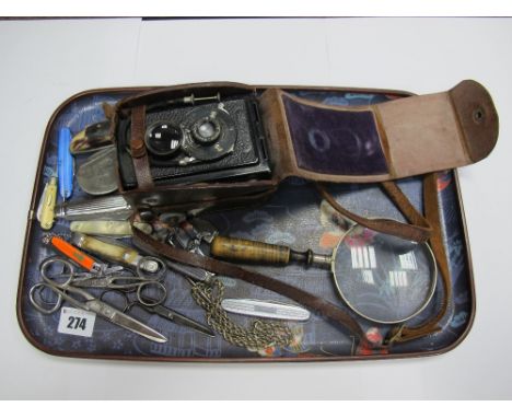 Voigllander Camera, pewter snuff boxes, pen knives, scissors, magnifying glass etc:- One Tray 