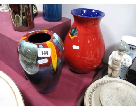 A Poole Pottery Bulbous Vase, with abstract flowers on red ground, 25cms high, another of ovoid form. (2) 