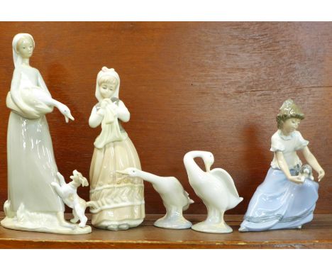 Four Nao/Lladro figurines and one other, including ?Girl with Goose and Dog?, ?Girl with Puppy? and two Geese (5) 