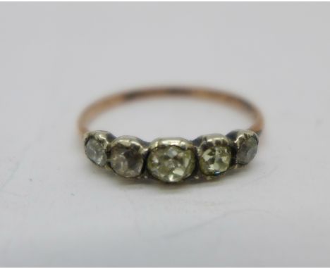 A Georgian five stone diamond ring, 1.1g, M, (gold shank, silver settings) 