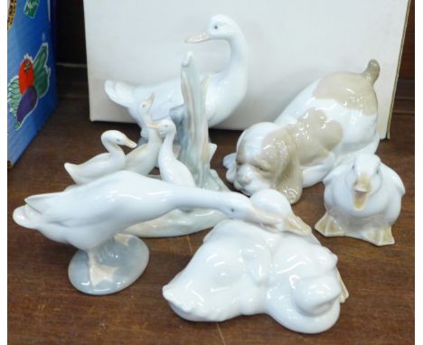 Three Nao ducks, a Lladro duck and two Nao figures, (two Nao figures boxed) 