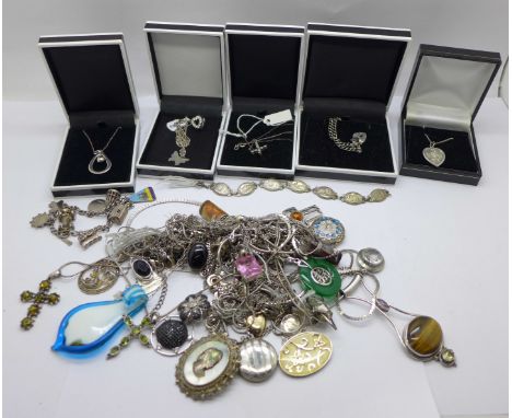 A collection of mainly silver jewellery, etc., including two charm bracelets, chains, pendants including one opal set, total 