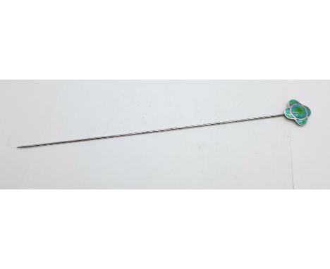 A silver and enamel hat pin, marked Sterling Silver 