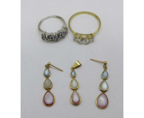 A 9ct white gold ring, P, a 9ct gold pendant and matching earrings and a gold plated three stone ring, Z, (9ct gold jewellery